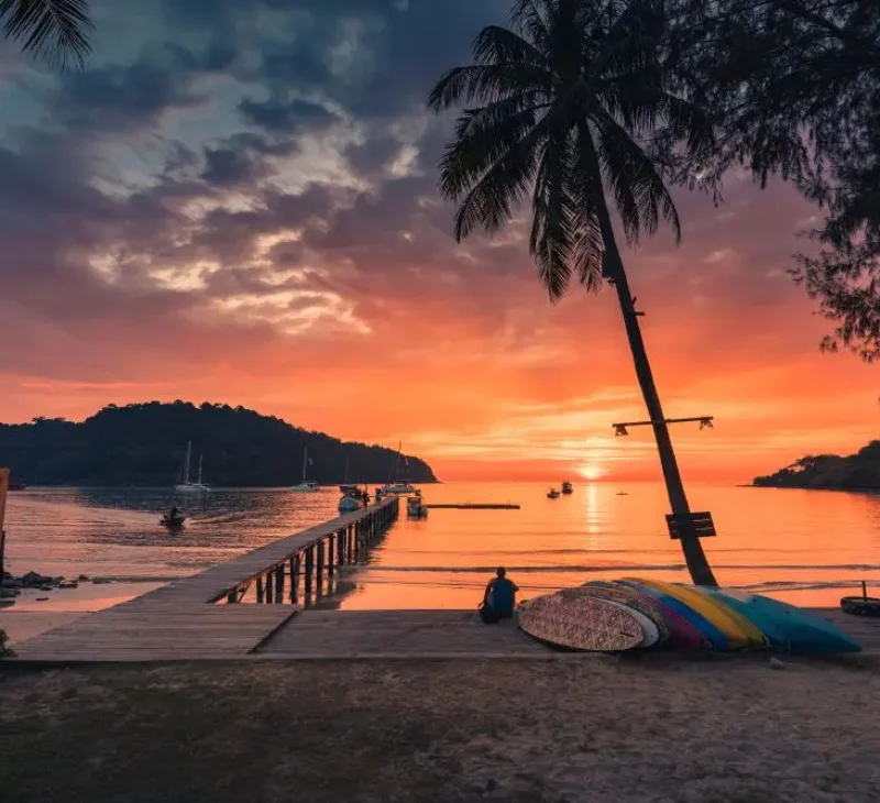 beautiful-sunset-over-tropical-sea-and-wooden-brid