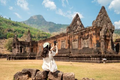 female-tourist-taking-photos-of-the-ancient-vat-ph-2026-05-14-17-48-36-utc