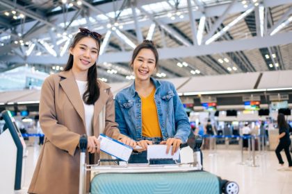 portrait-of-asian-women-standing-in-airport-termin-2025-03-27-02-29-38-utc