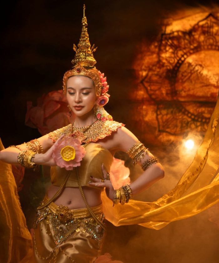 woman-in-ornate-costume-with-lotus-flower-2026-03-25-23-37-48-utc